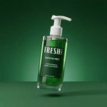 Green bottle with pump labeled 'Fresh Labs' on a green background