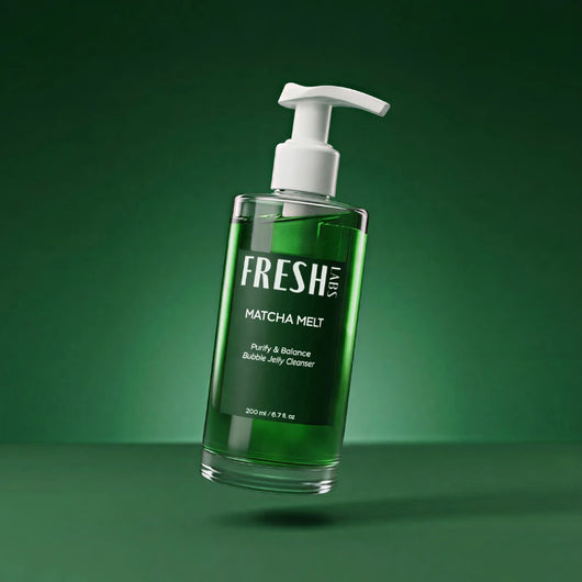 Green bottle with pump labeled 'Fresh Labs' on a green background